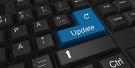 Tastatur mit blauer Enter-Taste, die mit Update beschriftet ist